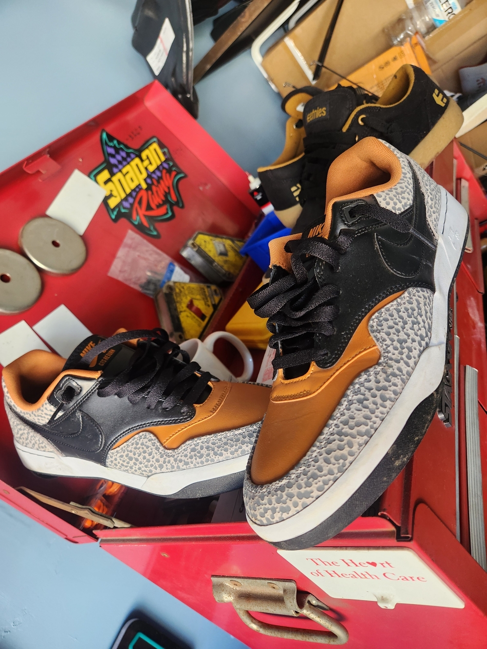Nike Men’s Low-Top Sneakers in Black, Brown, and Gray Animal Print